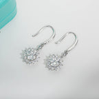 The Soleil Earrings — 1ct sunflower moissanite drop earrings, front — Aurora Moissanite