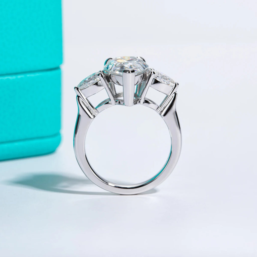 The Orla Ring lifestyle — 6cttw pear moissanite ring worn on finger — Aurora Moissanite