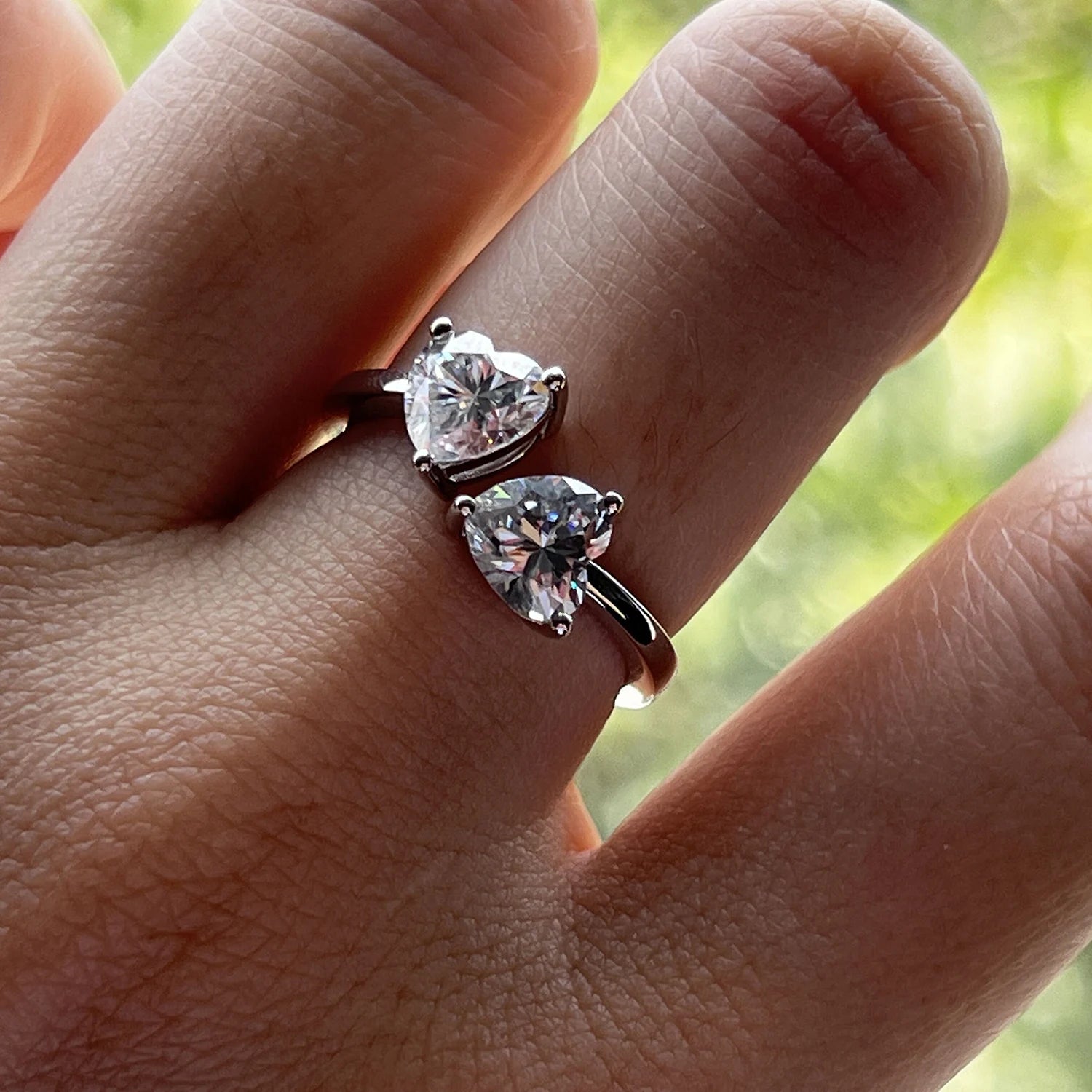 The Calla Ring worn — 2ct heart moissanite two-stone open-band ring, S/M/L sizes — Aurora Moissanite