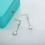 The Lace Earrings lifestyle — moissanite classic charm earrings worn — Aurora Moissanite