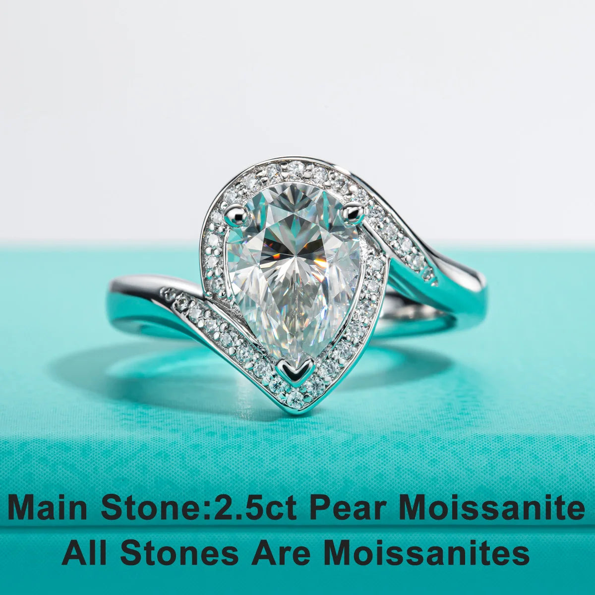 The Bria Ring worn — 2.5ct pear moissanite halo engagement ring, S925 — Aurora Moissanite