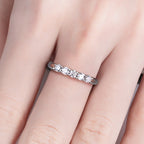 The Cord Band lifestyle — 3mm moissanite bezel band worn on finger — Aurora Moissanite