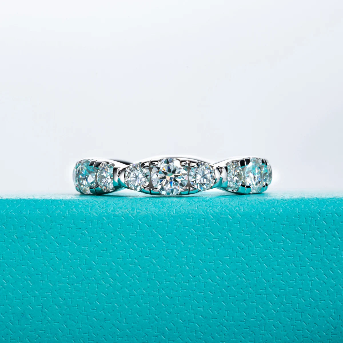 The Cirra Band — moissanite full eternity ring, front view, 18K white gold — Aurora Moissanite