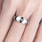 Moissanite spinner band top view, outer band rotates on fixed inner ring — Aurora Moissanite