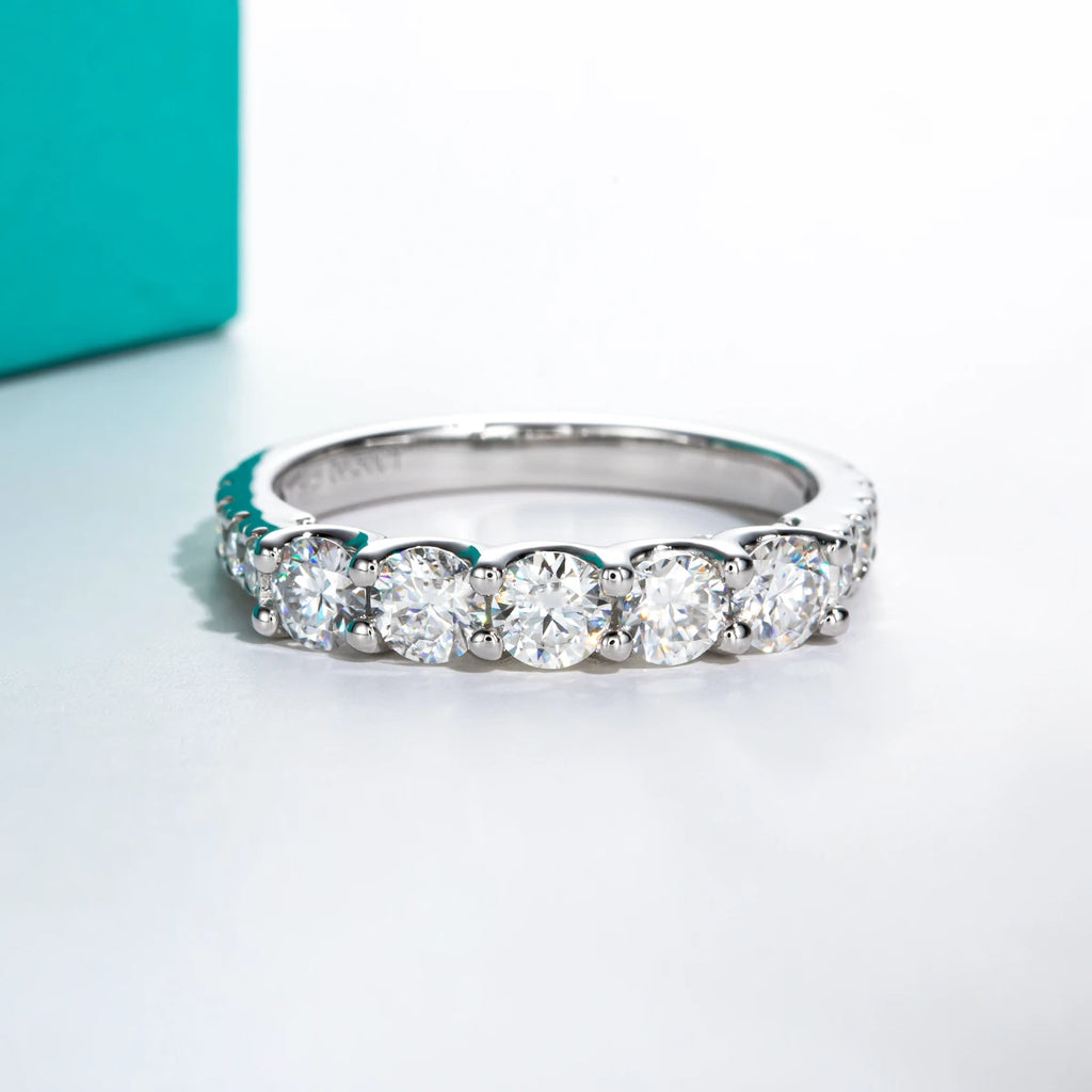 Moissanite 5-stone band 4mm D color VVS1, prong setting detail — Aurora Moissanite