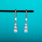 The Wisp Earrings — 1.8cttw moissanite dangle drops, front — Aurora Moissanite