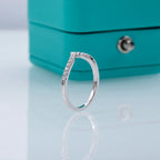 V-row moissanite ring, side profile, 18K white gold plated sterling silver — Aurora Moissanite
