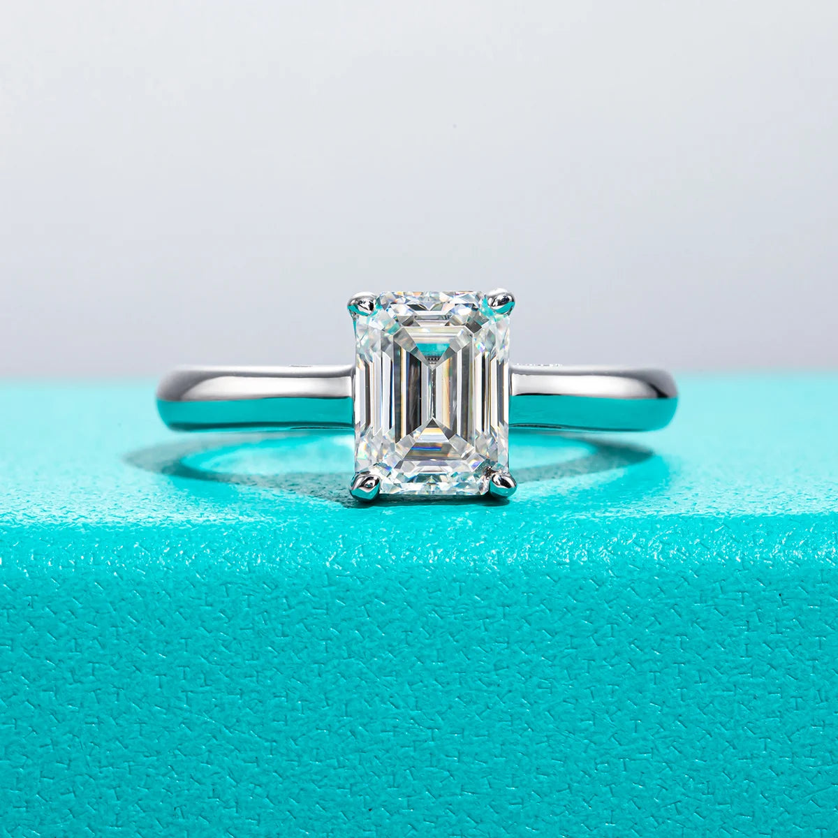 The Brae Ring — 2ct emerald moissanite solitaire, front view — Aurora Moissanite