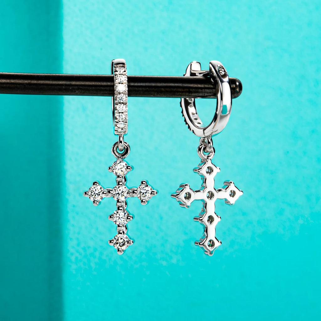 The Kael Earrings — moissanite cross huggie hoops, front view — Aurora Moissanite