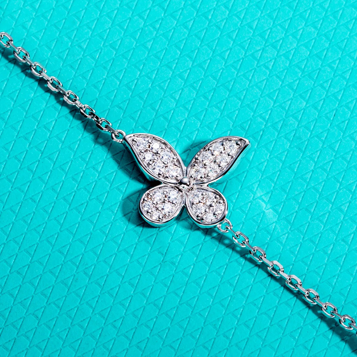 The Wing Bracelet — moissanite butterfly charm bracelet, front view — Aurora Moissanite