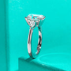 The Deia Ring — emerald pear moissanite channel setting, front view — Aurora Moissanite