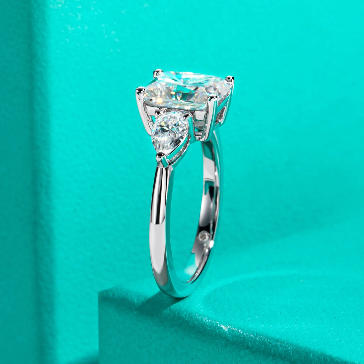 Radiant cut moissanite 3ct D color VVS1 with pear accent, two-stone detail — Aurora Moissanite